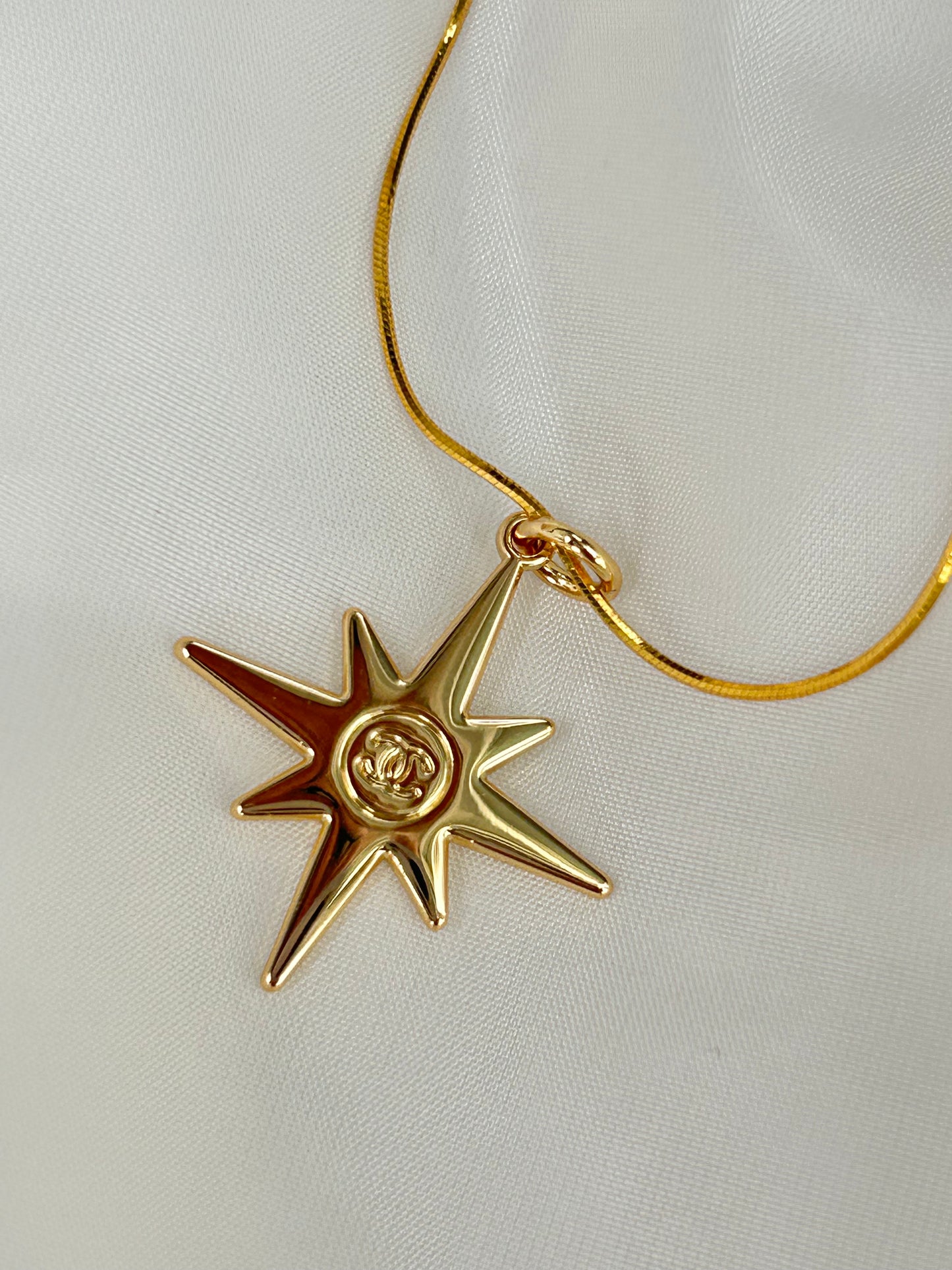 Chanel Christmas star necklace