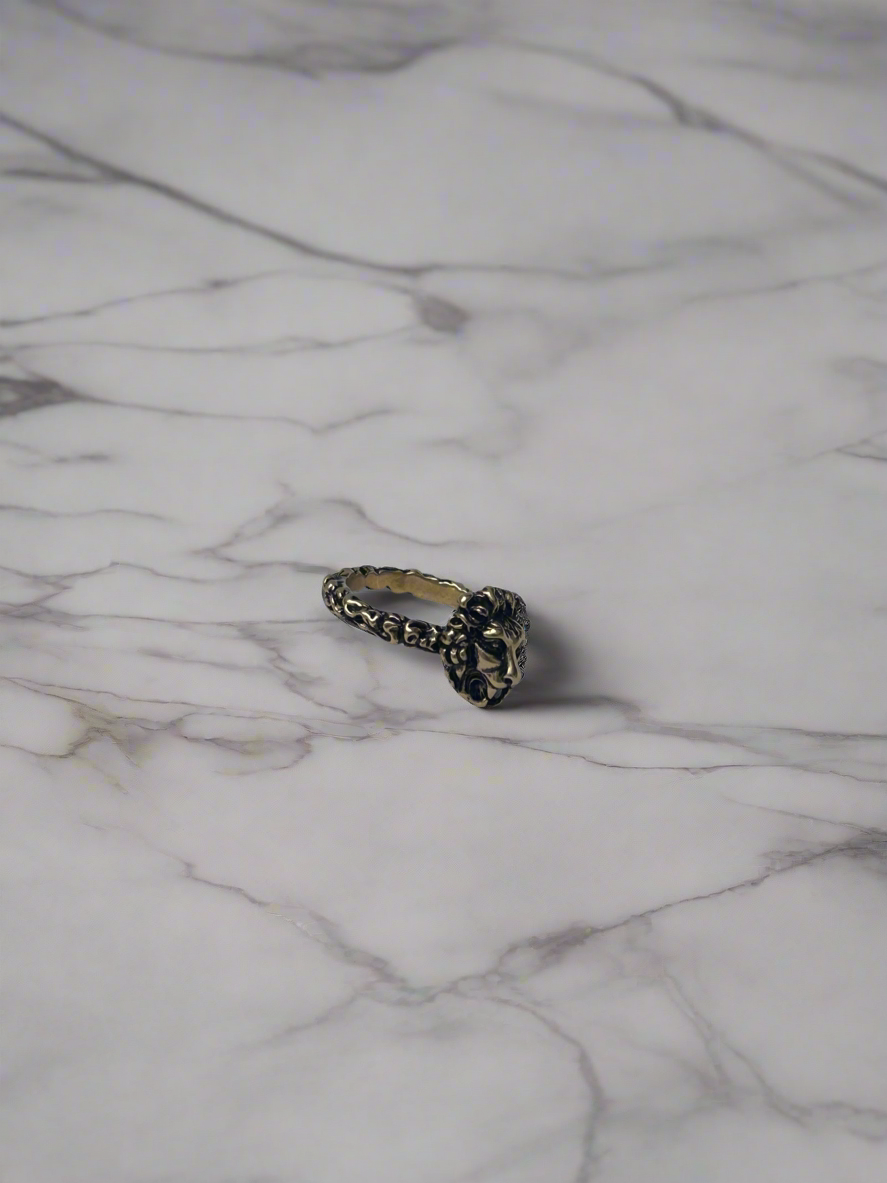 Gucci lion head brass ring