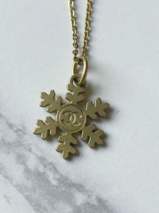 Chanel Snowflake edition brass necklace