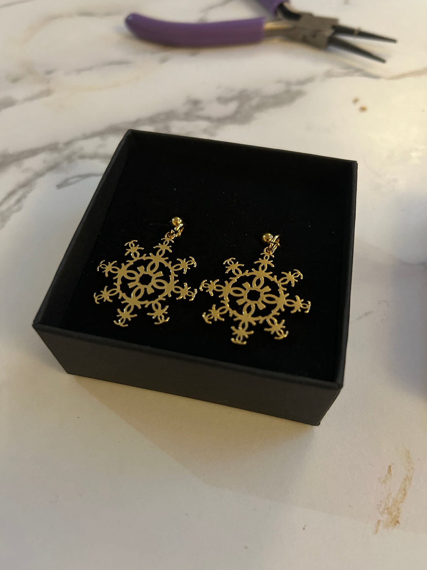 Chanel Christmas edition snowflake earrings