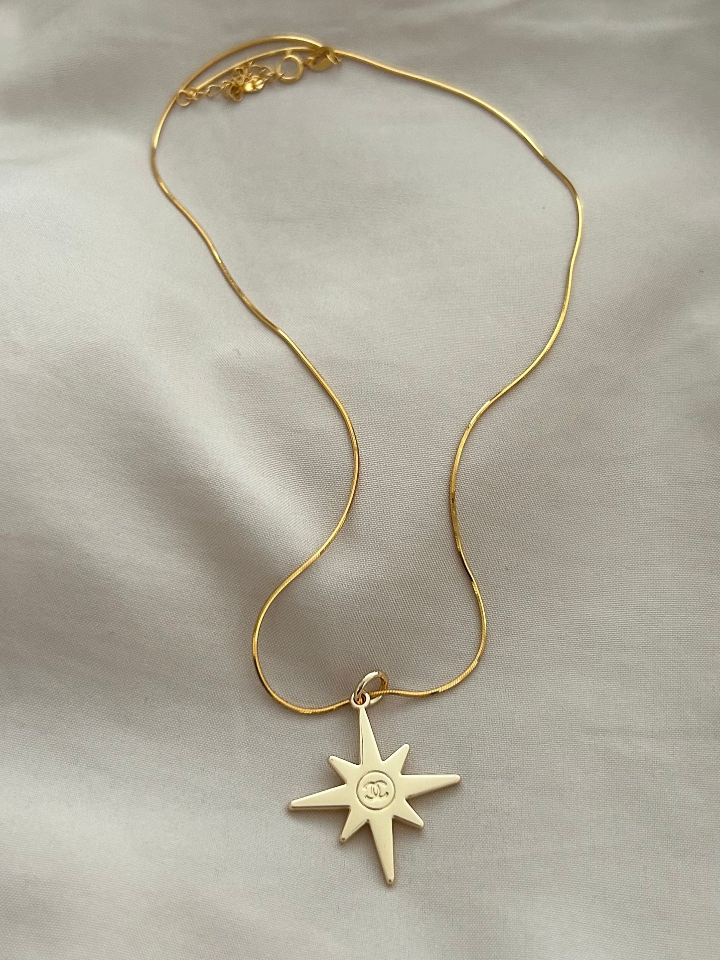 Chanel Christmas star necklace