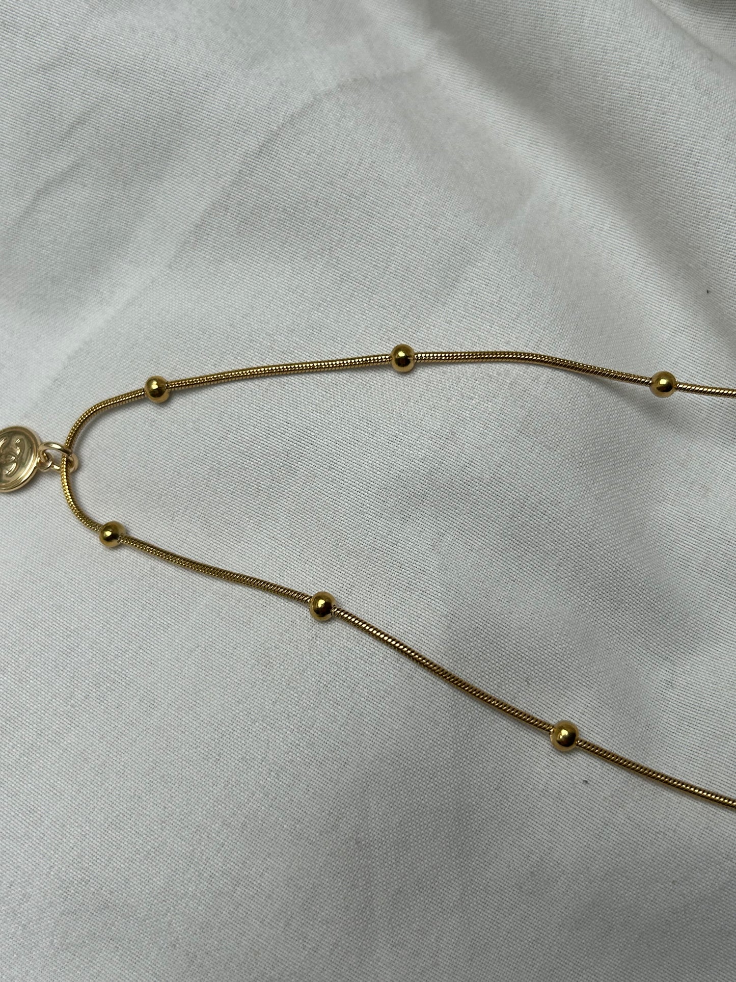 Lil’ Chanel on baller chain gold plate