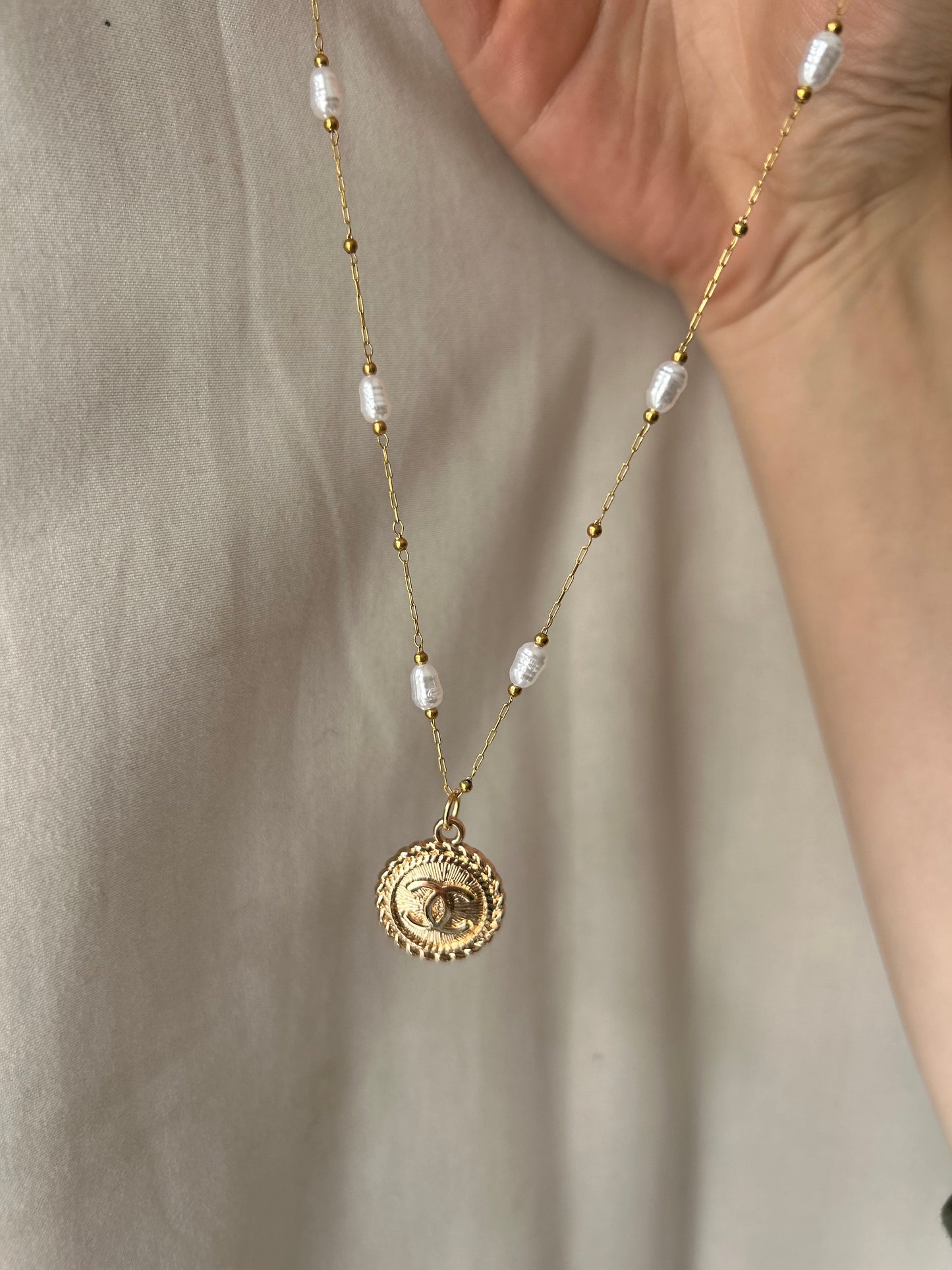 Chanel pearl and goldie