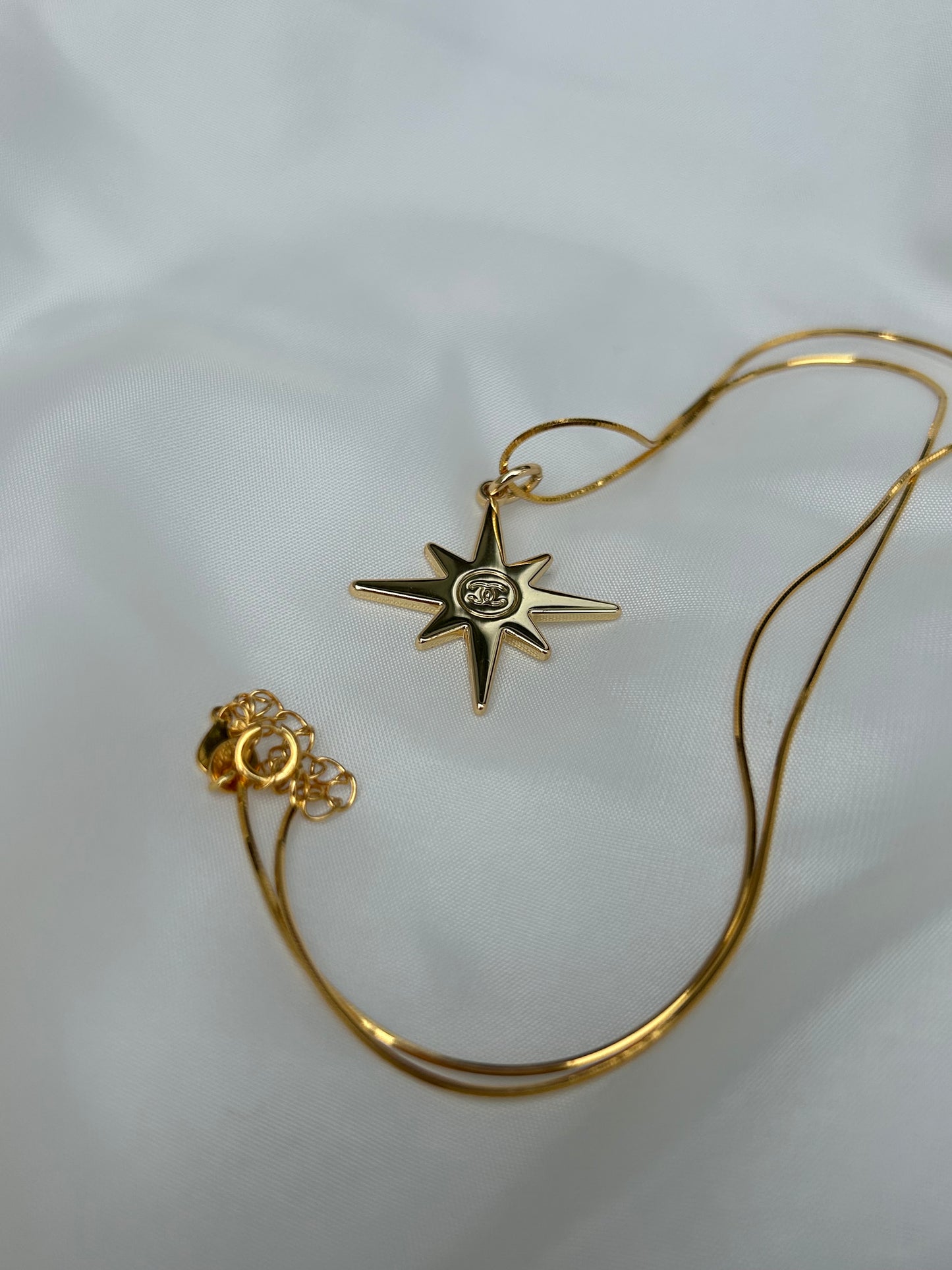Chanel Christmas star necklace