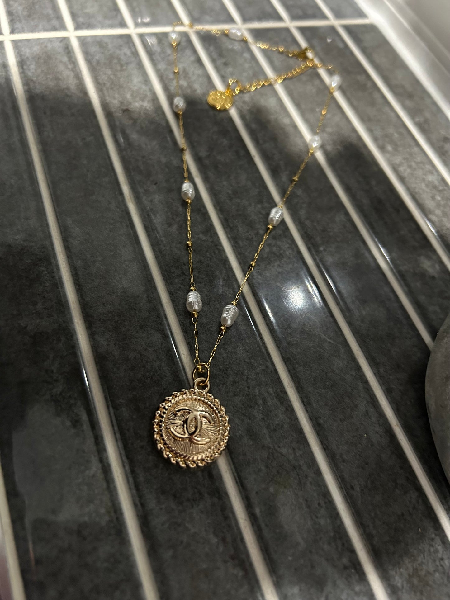 Chanel pearl and goldie