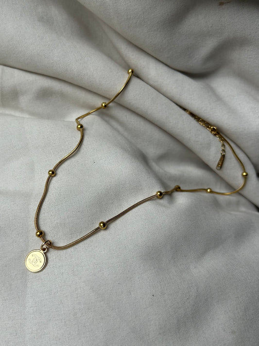 Lil’ Chanel on baller chain gold plate